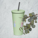 Sheep Insulated tumbler with a straw featuring colorful designs and a silver straw on a light background.