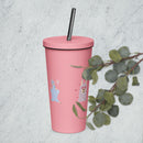 Sheep Insulated tumbler with a straw featuring colorful designs and a silver straw on a light background.