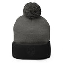 Pink Alien Pom-Pom Beanie in gray and black with a fluffy pom-pom on top and embroidered alien design.